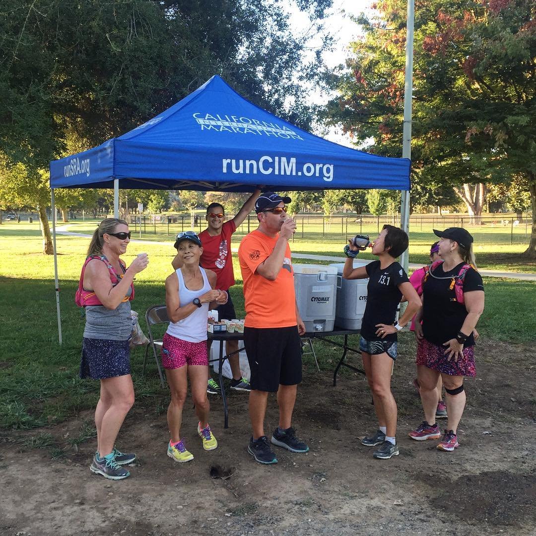 Happy runners, happy volunteers! 
Treating everyone running on the parkway with nuun, GU and water as they train for CIM